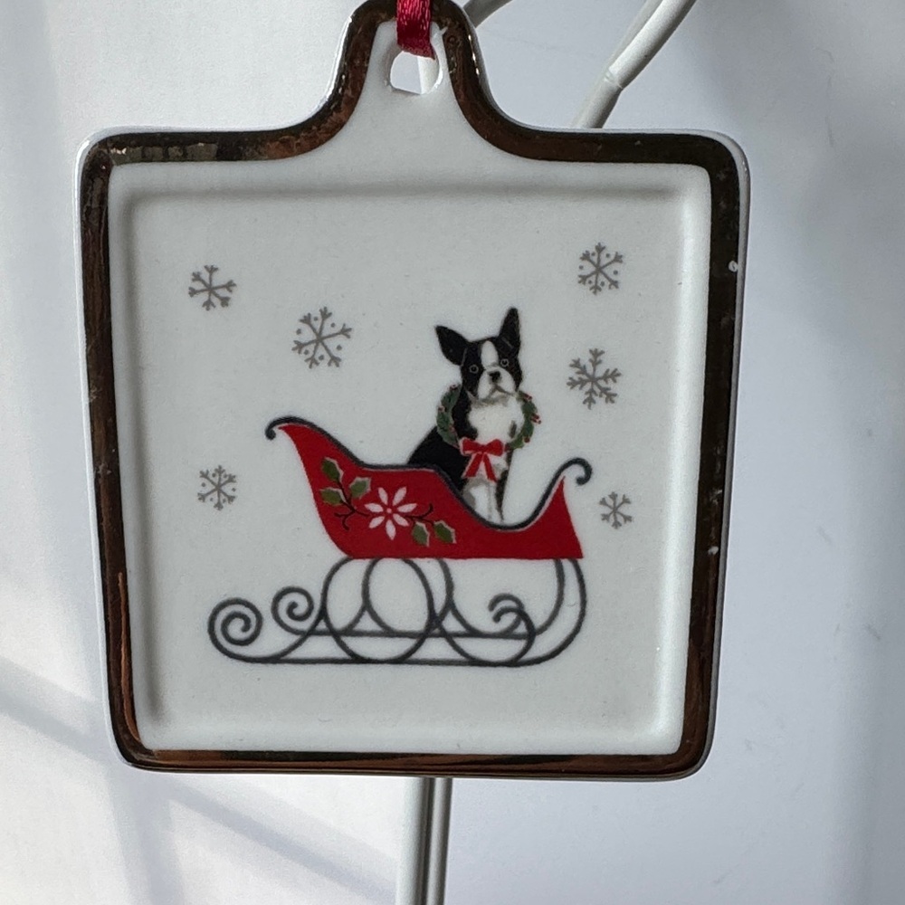 3/$22
Fringe Christmas ornament featuring a Boston Terrier dog in a red sleigh